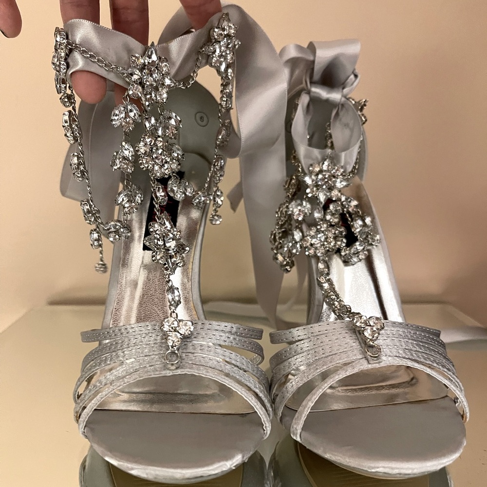 NWOB Silver satin tie up open toe dress heels with rhinestones.